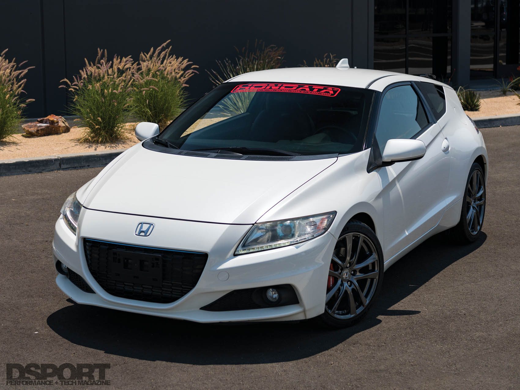 White Honda CR-Z parked outside