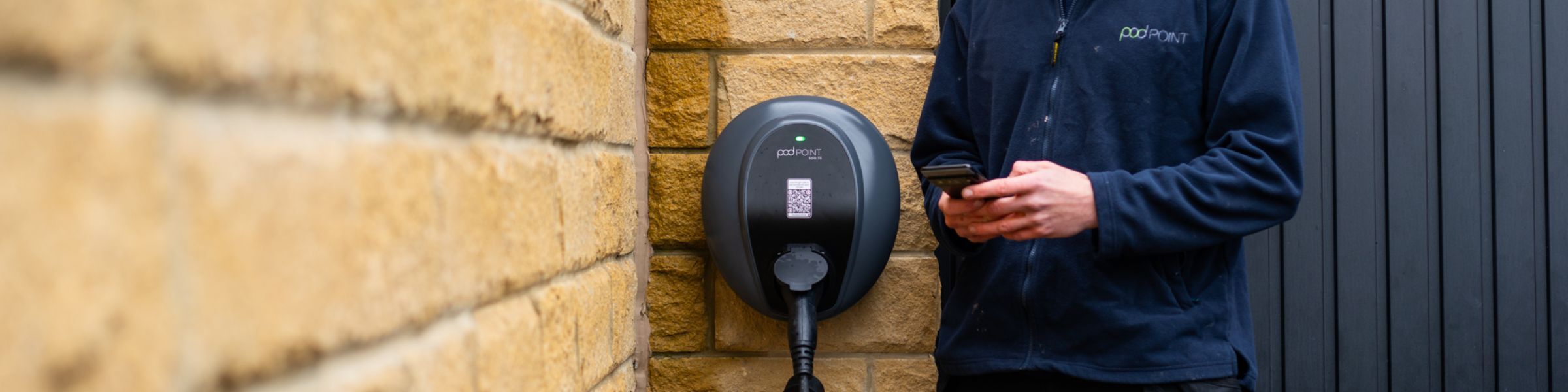 Worker at EV charging station