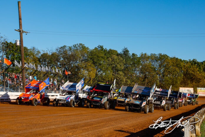 Sprint cars racing on dirt