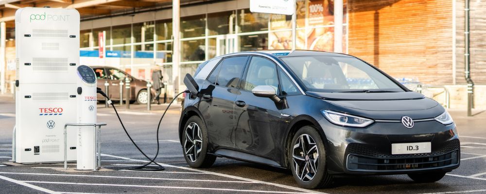 Black Volkswagen charging at Tesco station