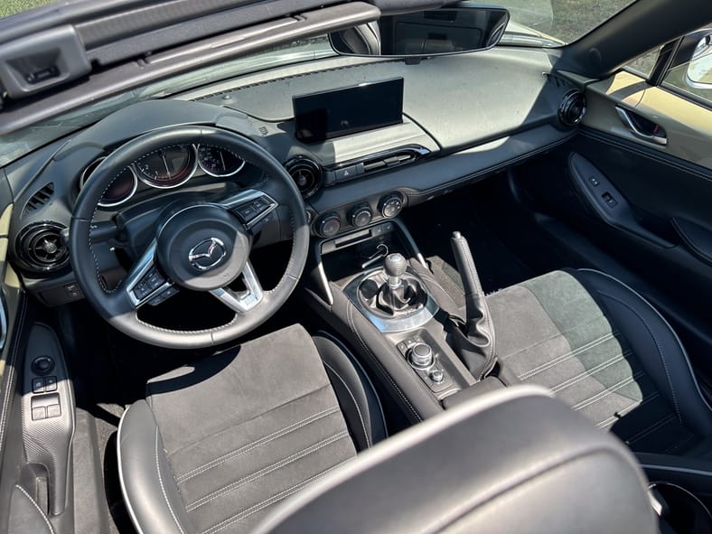 Miata cockpit with red leather seats