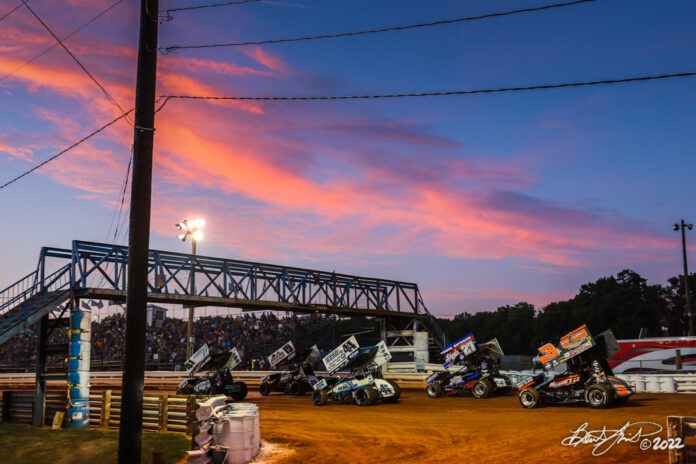 Sprint cars lined up on track