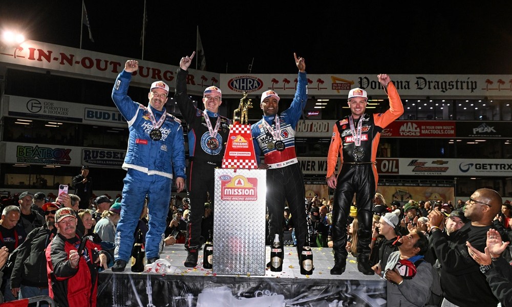 NHRA champions celebrate on stage