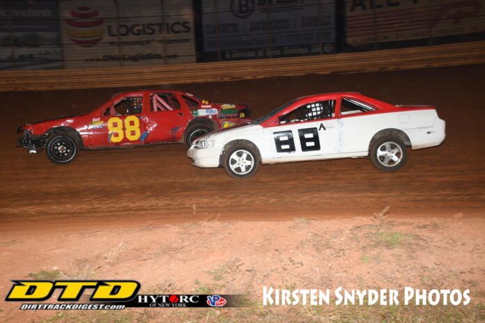 Racing cars on dirt track