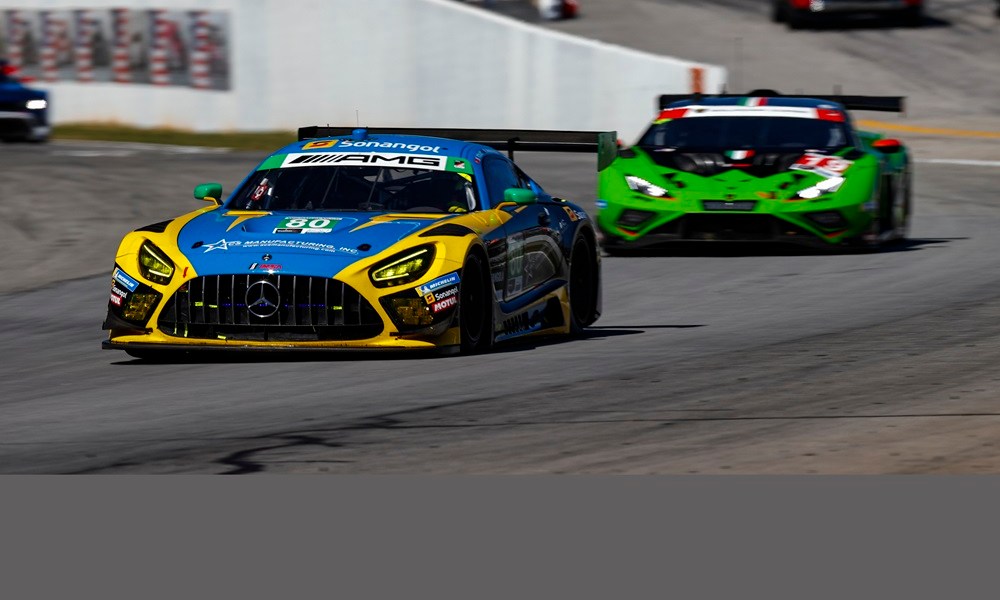 Two IMSA cars racing at Atlanta