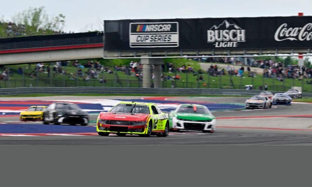 NASCAR cars racing at COTA