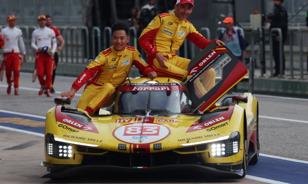 Two racers in yellow car