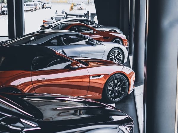 Modern cars displayed at dealership showroom