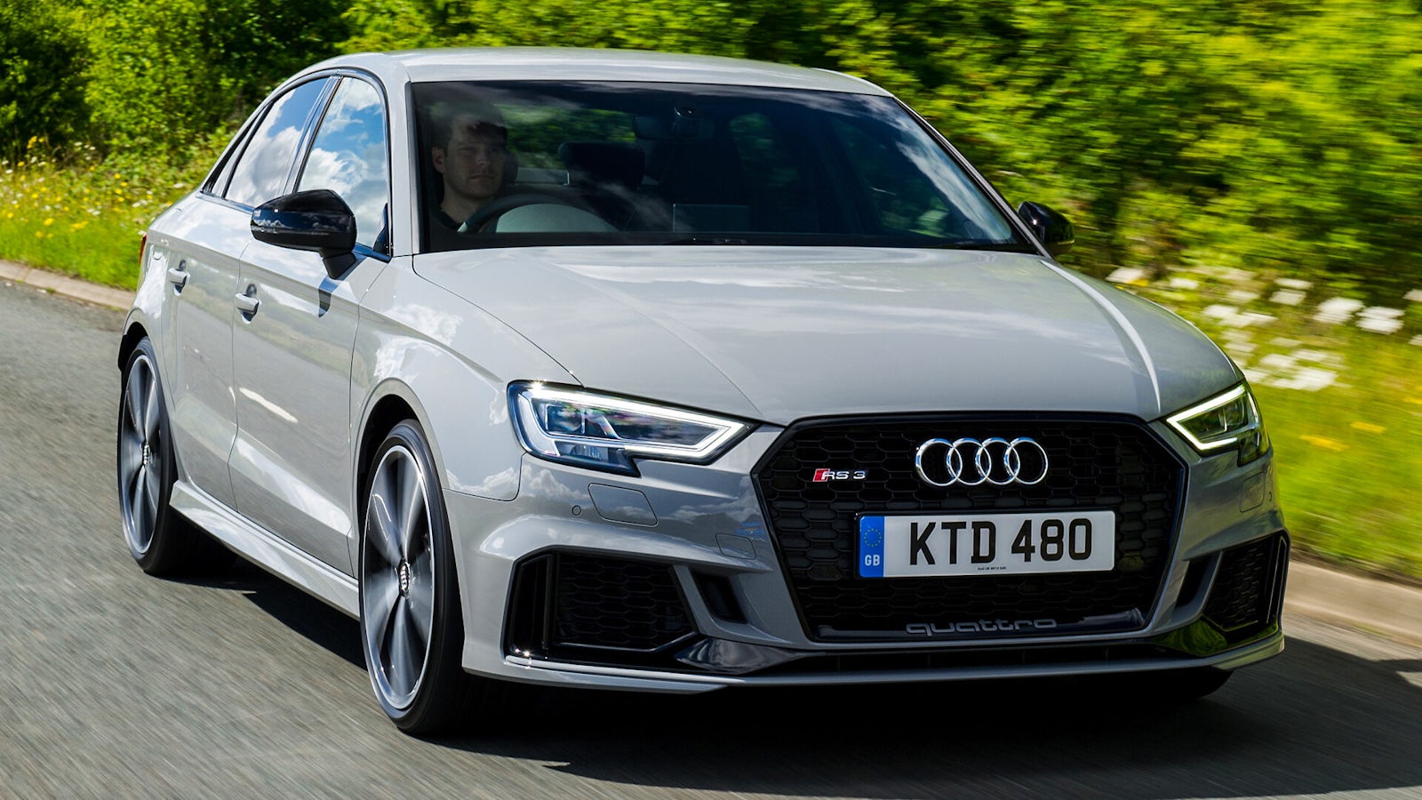 Gray Audi RS3 on road