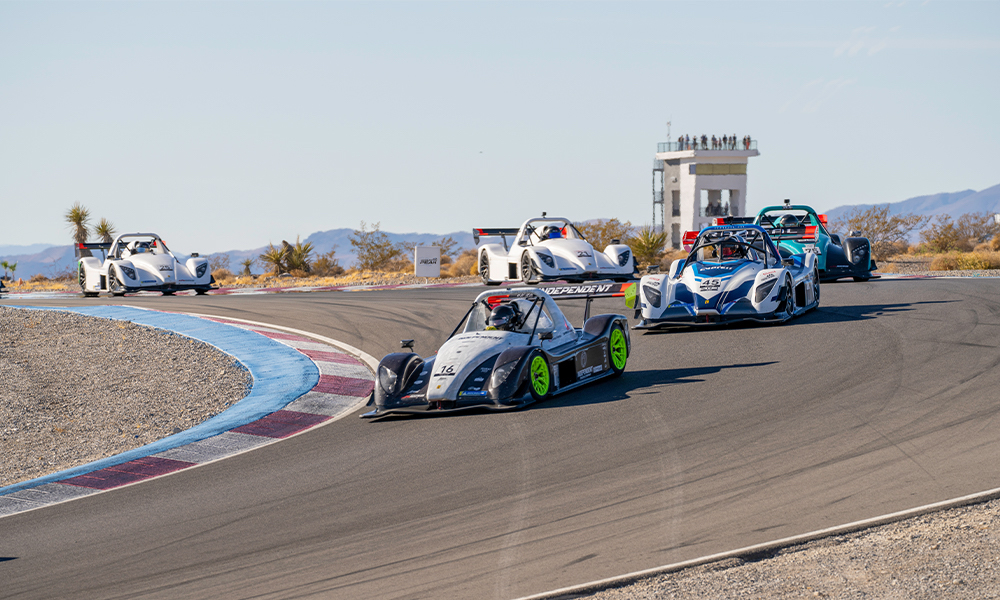 Race cars competing on racetrack