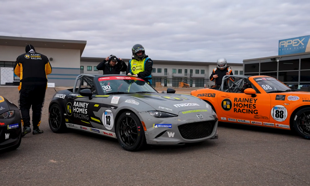 Two race cars competing on track