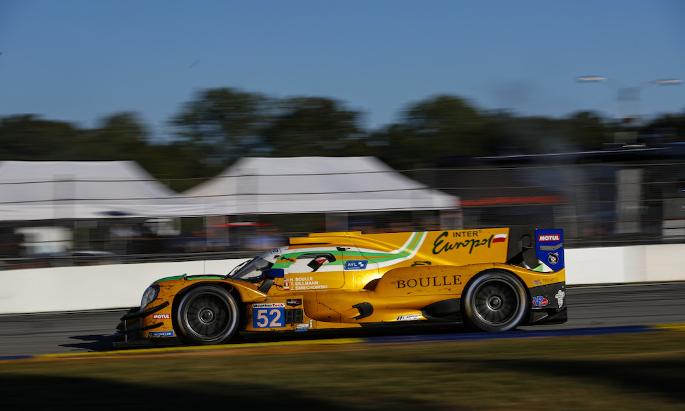 Yellow Corvette racing at Daytona