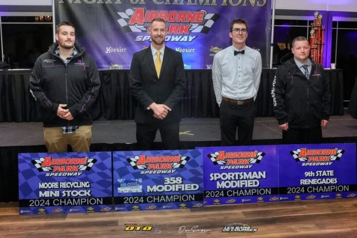 Four racers at awards ceremony