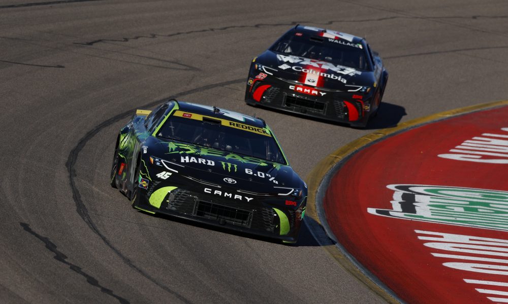 NASCAR stock cars racing side-by-side