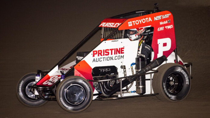 Sprint car racing on dirt track