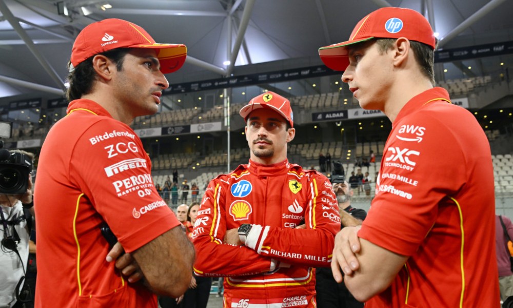 Three Ferrari drivers pose together