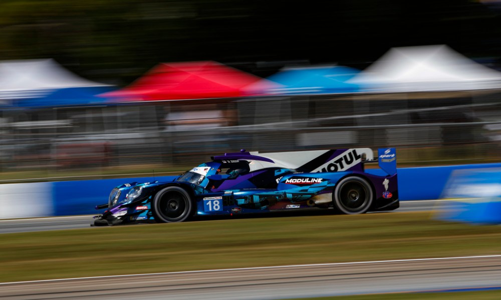 Purple race car at IMSA event