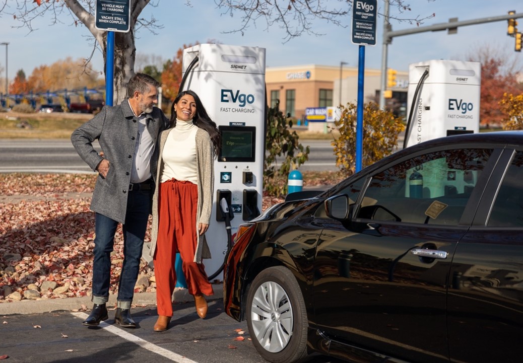 Couple charging car at EVgo station