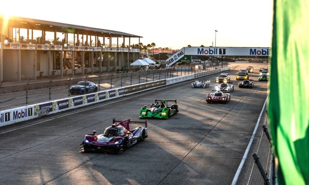 Race cars competing on racetrack