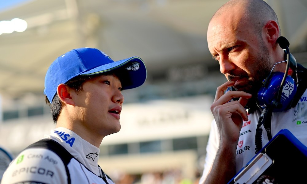 Man talking with racing driver