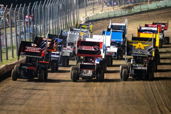 Modified Sprint cars racing on dirt