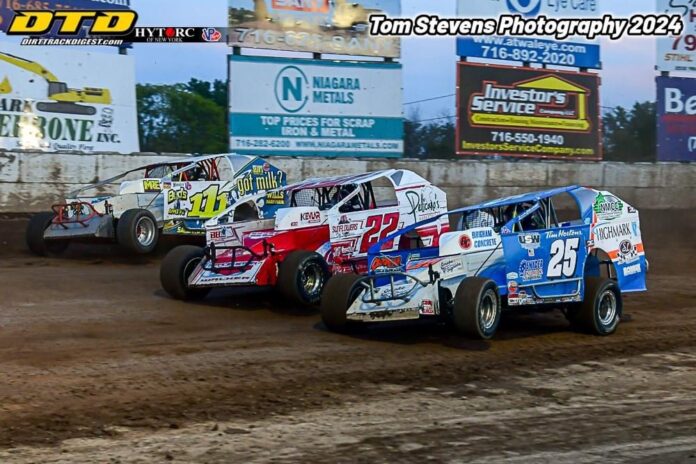 Three dirt track racing cars