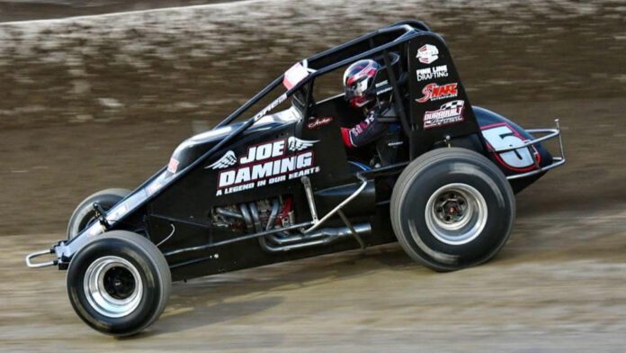 Sprint car racer on dirt track