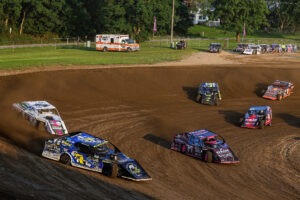 Dirt modifieds racing on track