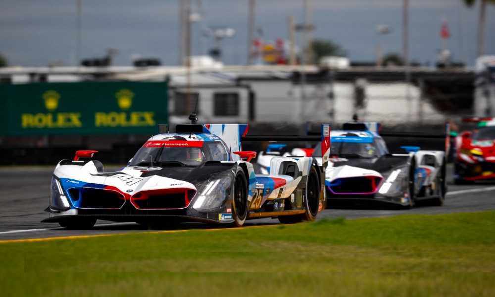 IMSA race cars battling at Daytona