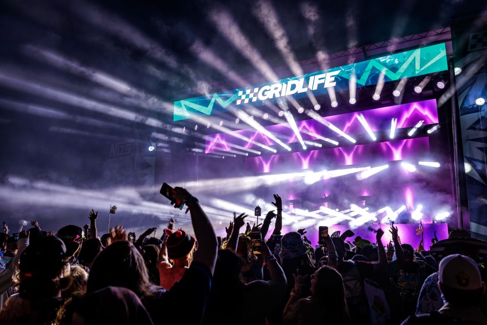 Concert crowd enjoying outdoor festival