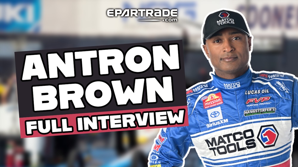 Antron Brown smiling at camera