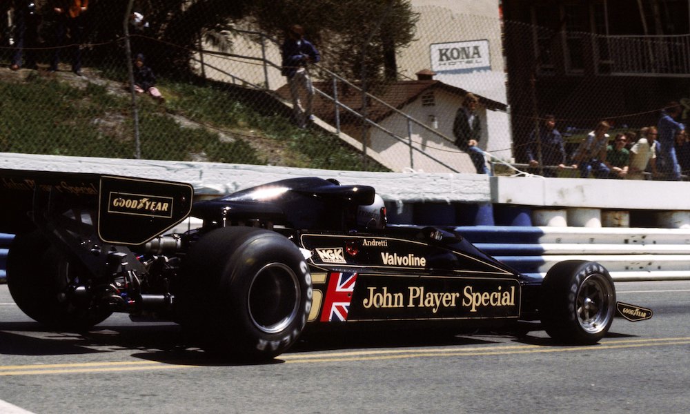 Black race car on racetrack