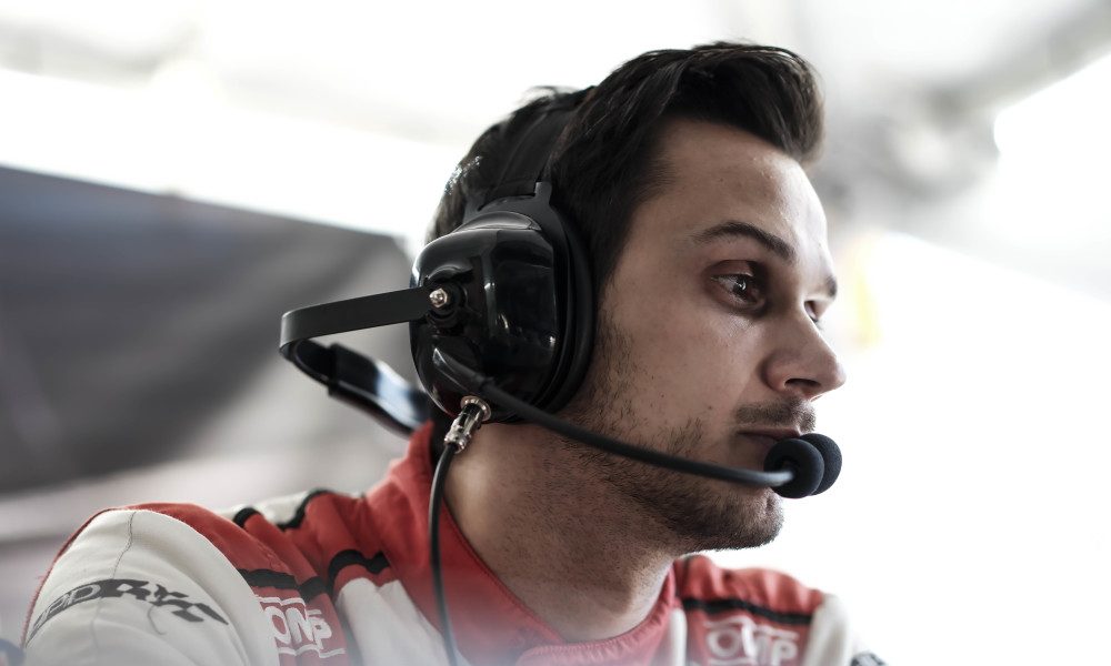 Racing driver with headset