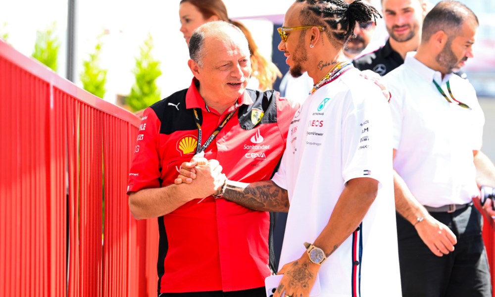 Racetrack handshake between racing team members