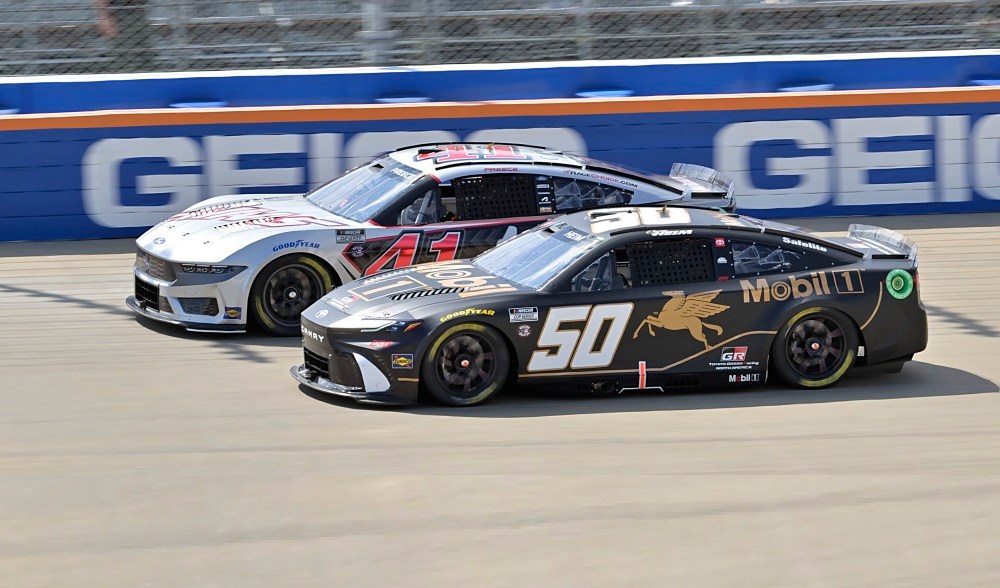 NASCAR racecars competing on track