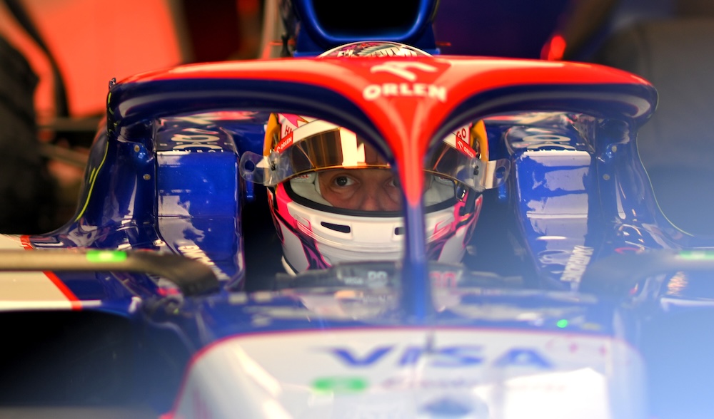 F1 driver helmet on racing track