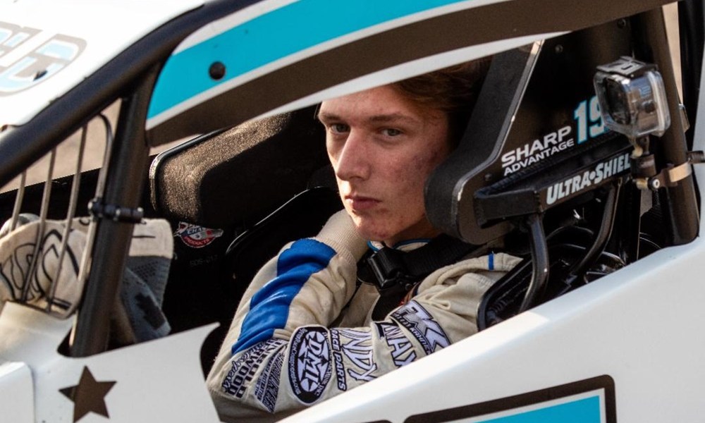 Race car driver in cockpit