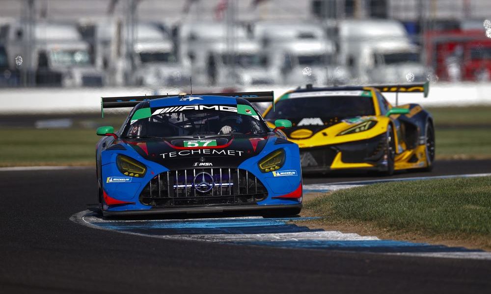 Two IMSA racecars compete at Indianapolis