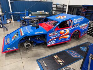 Vintage blue racecar in garage