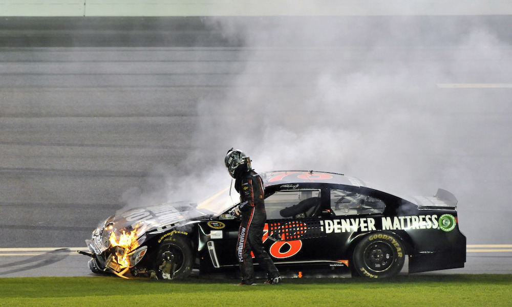 Racing car engulfed in flames