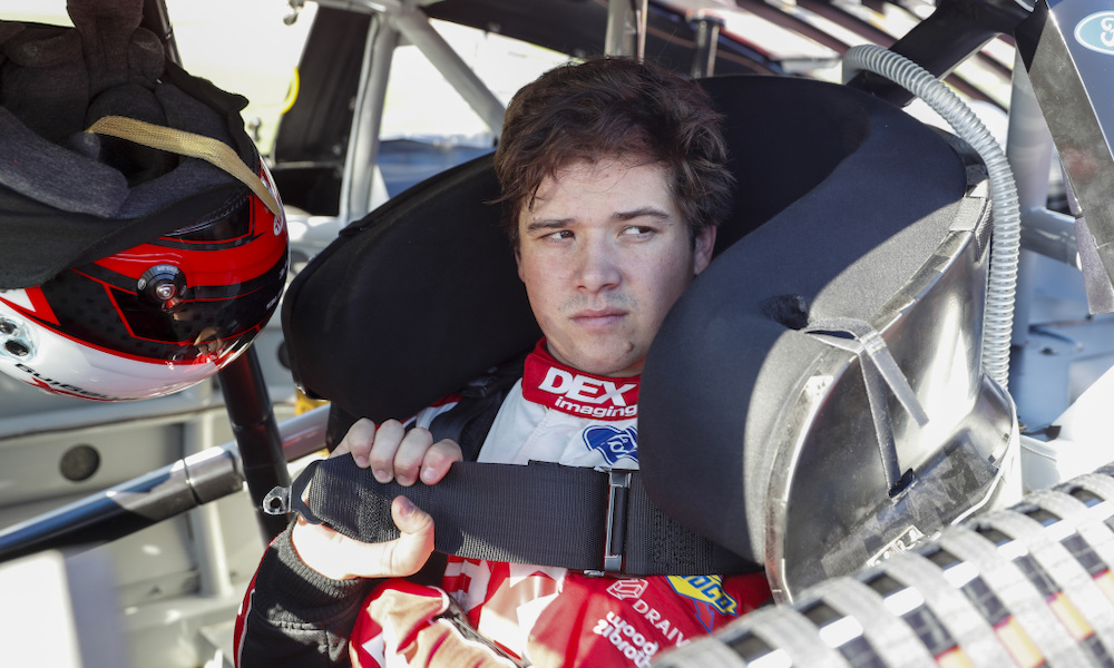 Race driver in cockpit view