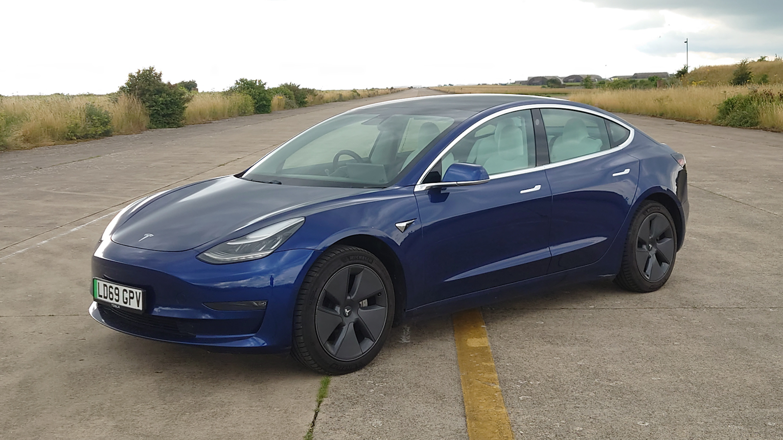 Blue Tesla Model 3 Performance sedan