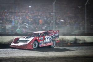 Sprint car racing on dirt track