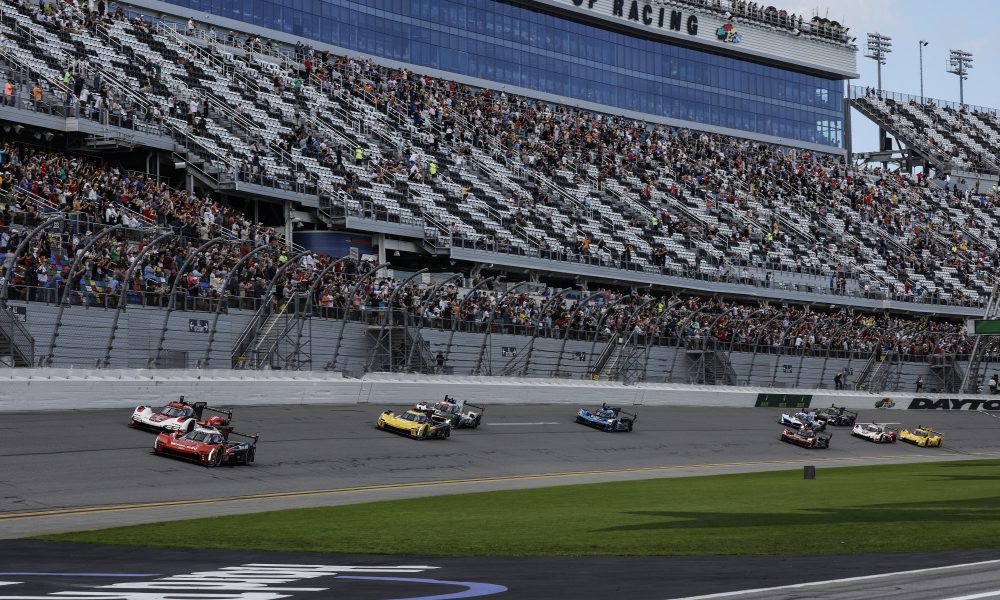 Race cars competing on Daytona track