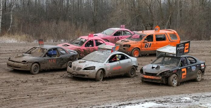 Dirt track race cars competing