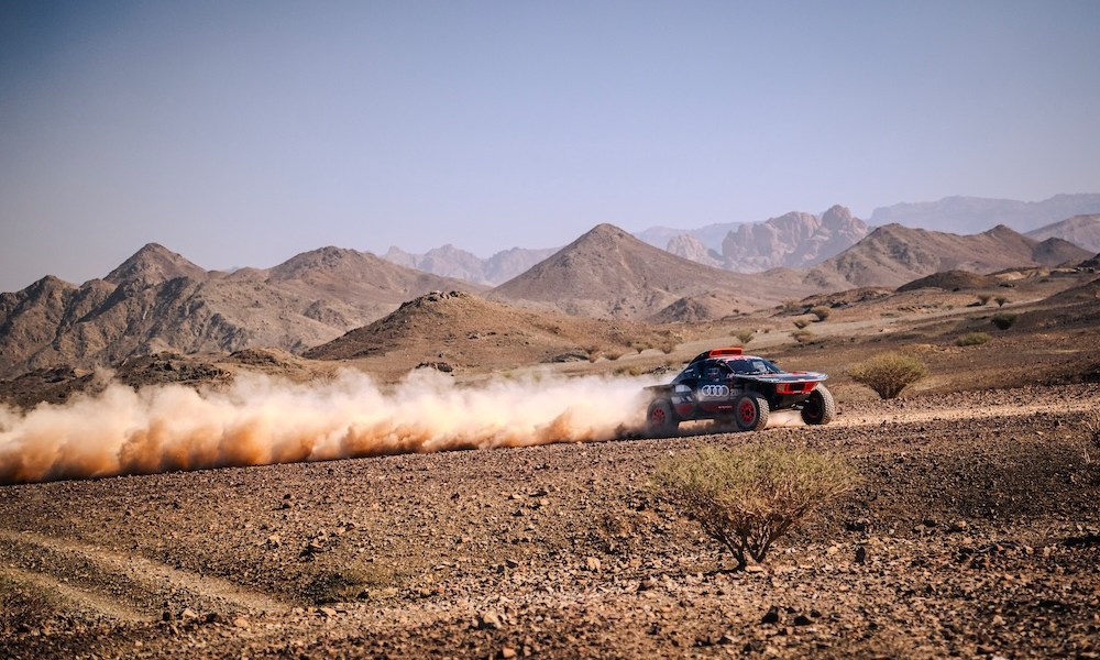 Off-road racer sprays desert dust