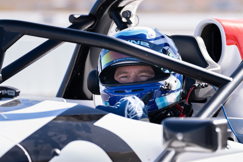 Race driver in cockpit