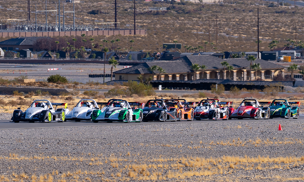 Race cars lined up at track