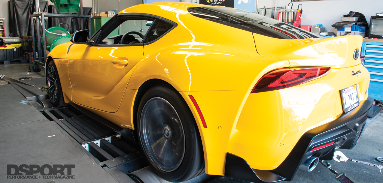 Yellow Supra on service lift