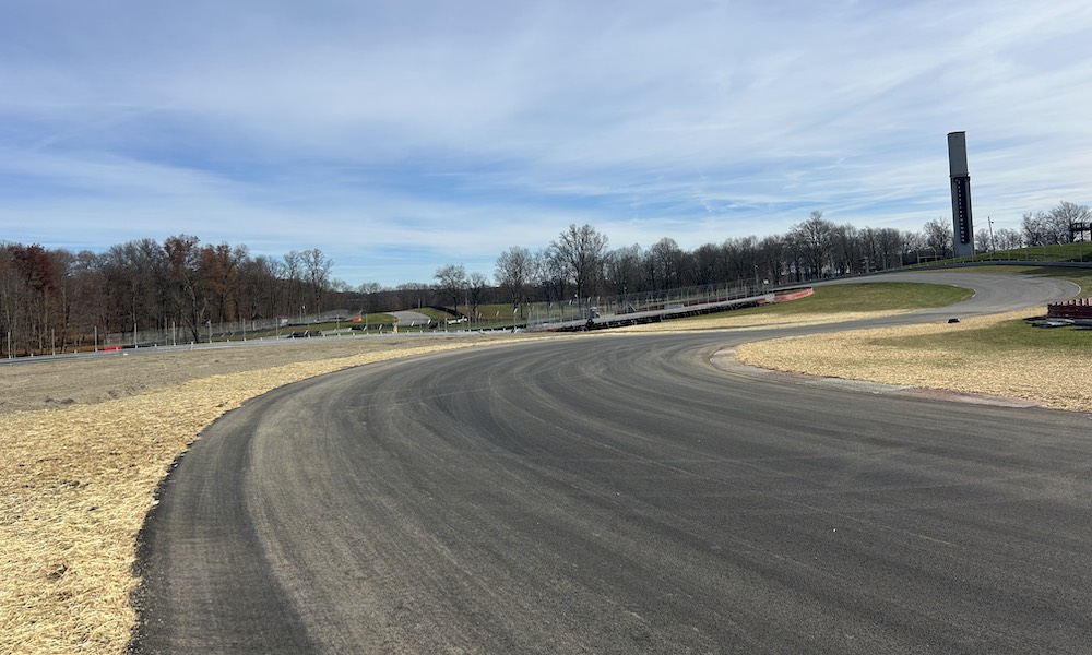 Racetrack bend with forested backdrop